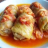 Hungarian stuffed cabbage rolls simmered in savory tomato sauce for a hearty traditional meal.