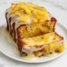 Moist juicy pineapple heaven cake topped with pineapple chunks and sweet glaze