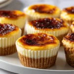 Crème brûlée cupcakes with a crunchy, torched sugar topping over a creamy custard-filled cupcake.
