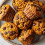 Pumpkin chocolate chip muffins with almond butter, topped with chocolate chips