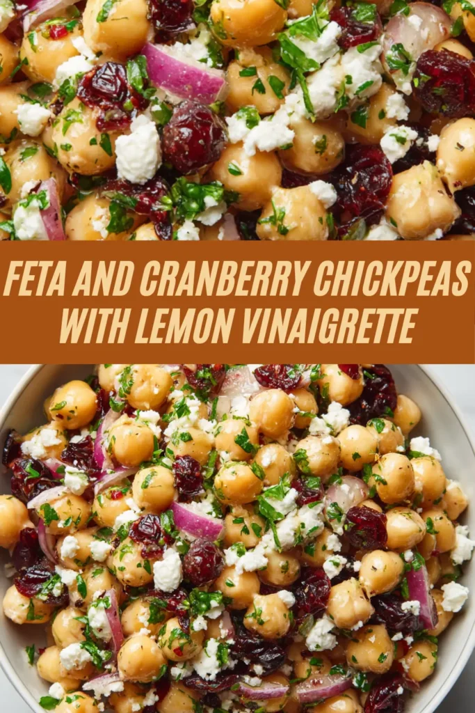 Chickpea salad with feta, dried cranberries, red onion, parsley, and lemon vinaigrette in a white bowl.