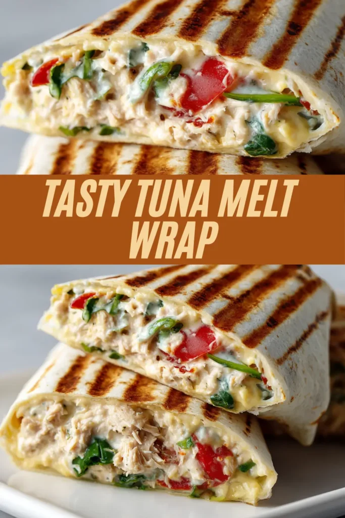 Grilled tortilla wrap stuffed with creamy tuna salad, melted cheese, and colorful vegetables, sliced to show the filling.