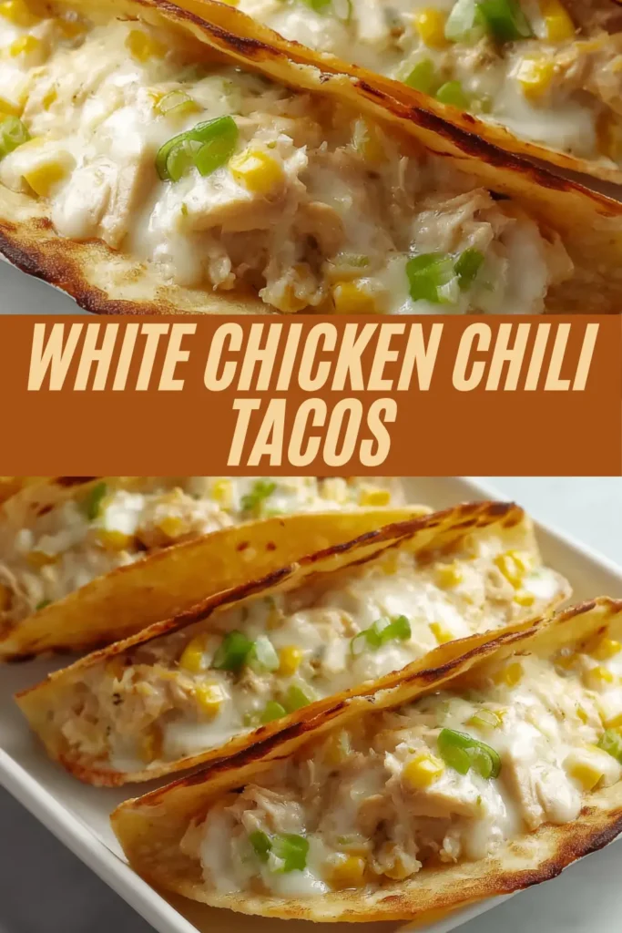 Crispy taco shells filled with creamy white chicken chili, corn, melted cheese, and diced green chiles on a rectangular plate.