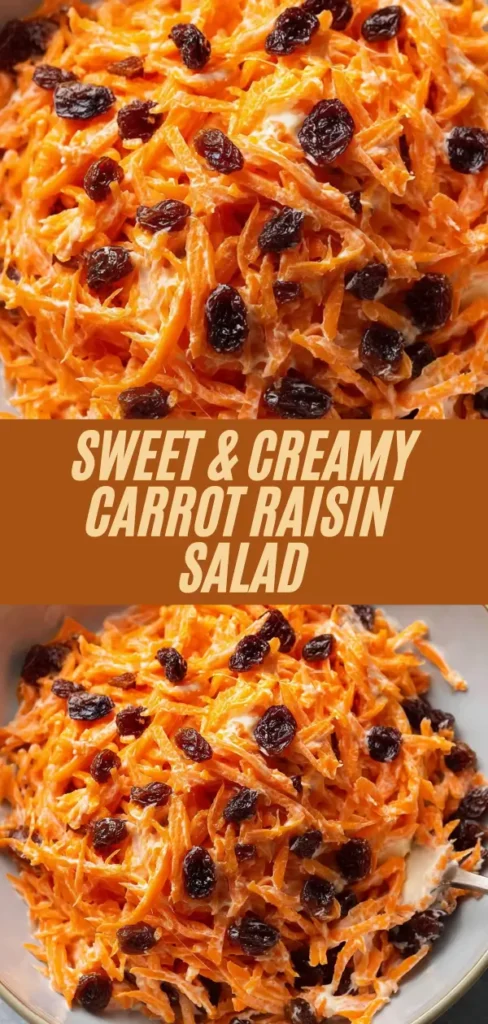 Heaping bowl of orange shredded carrots with raisins in creamy white dressing and spoon