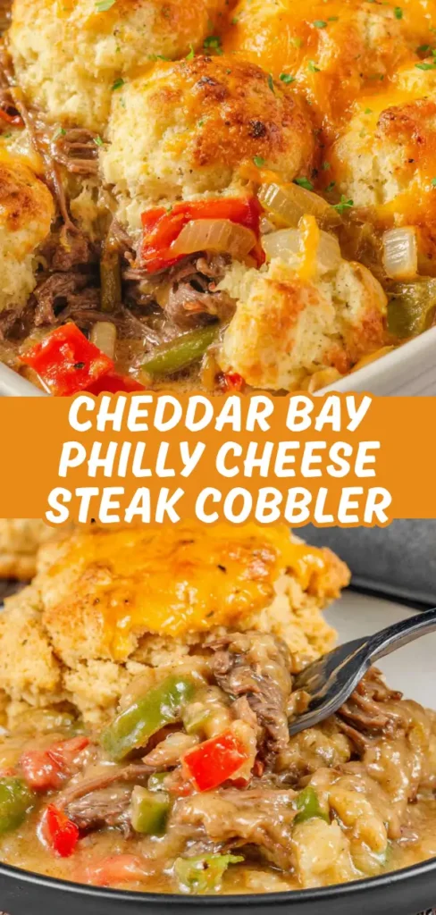 A close-up of a hearty cheddar bay Philly cheese steak cobbler, with tender shredded beef and colorful bell peppers in a savory gravy, topped with fluffy, golden biscuit crumbles and melted cheese.