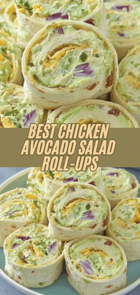 A plate of chicken avocado salad roll-ups filled with creamy avocado, shredded cheese, red onions, and chopped herbs, sliced to show the colorful filling.
