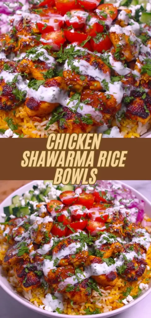 Close-up of Chicken Shawarma Rice Bowls topped with grilled chicken, cherry tomatoes, chopped herbs, and drizzled with creamy white sauce, served over rice with fresh cucumber and red onion garnishes.